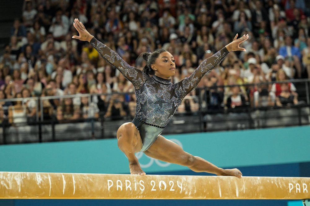 体操女团：美国队实力获得冠军